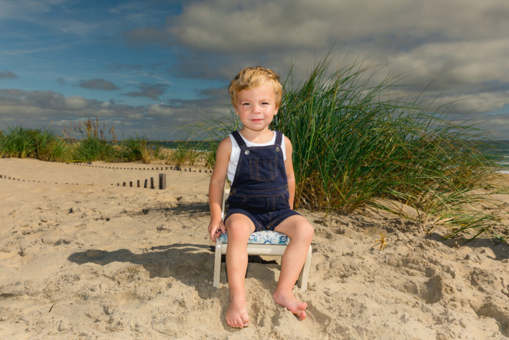 obx family beach photography and weddings mary ks photography obxboy in chair on beach in nags head obx
